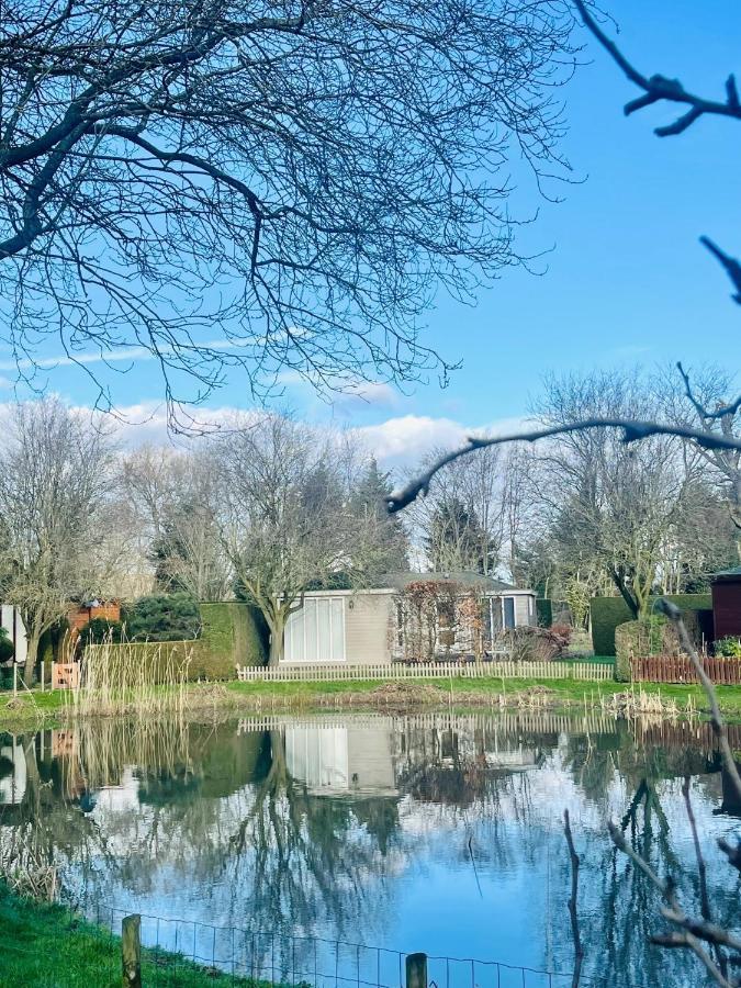 Recreatiepark De Markplas Opheusden ภายนอก รูปภาพ
